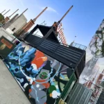 Container personalizzato con grafiche artistiche e terrazza scenografica per Jägermeister al Kappa FuturFestival, progetto firmato Phoenix International.