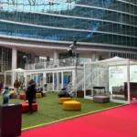 Installazione container eventi Phoenix International in Piazza Regione Lombardia con area relax e spazi espositivi